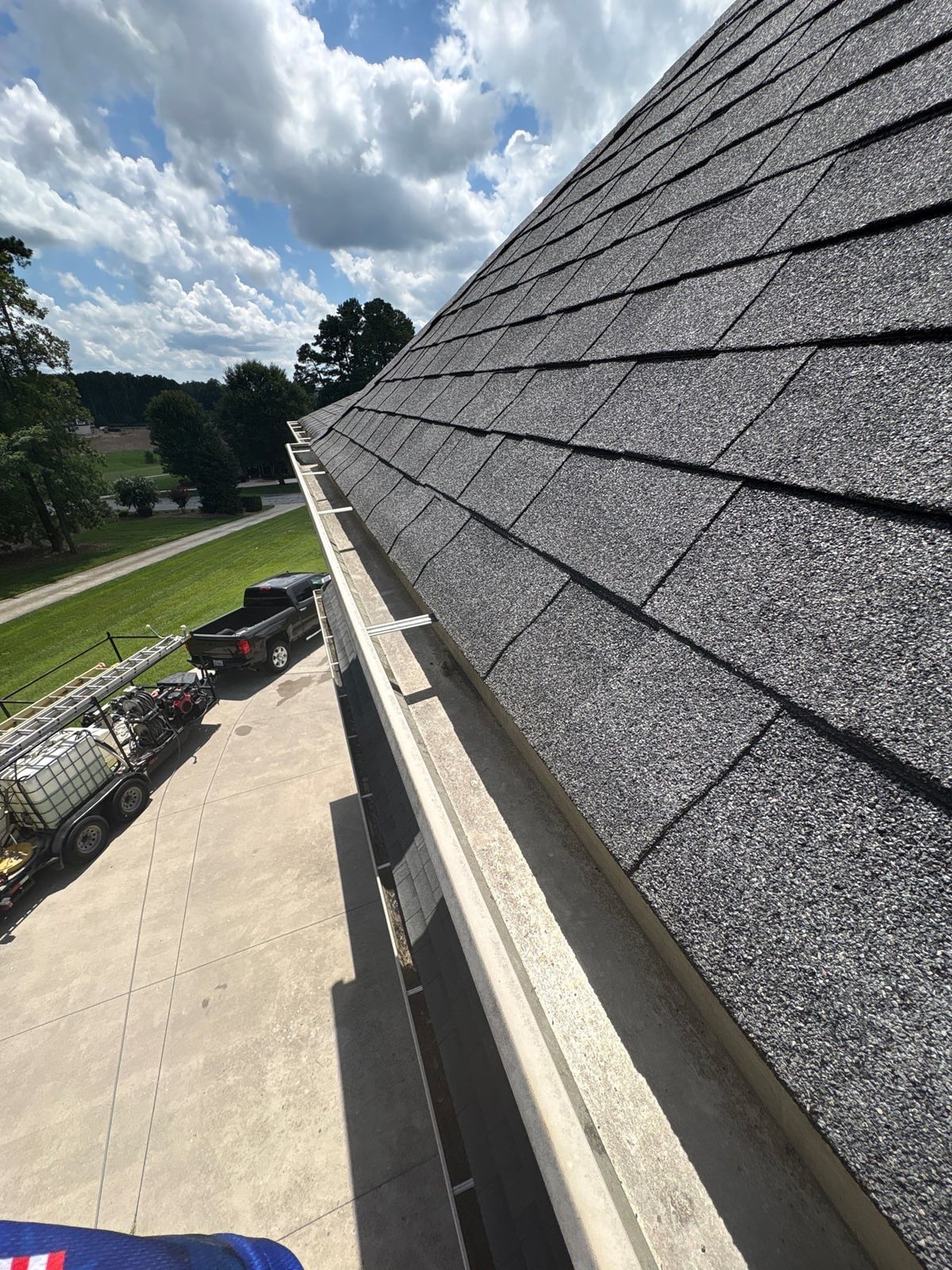 Residential roof gutter cleaning and debris removal