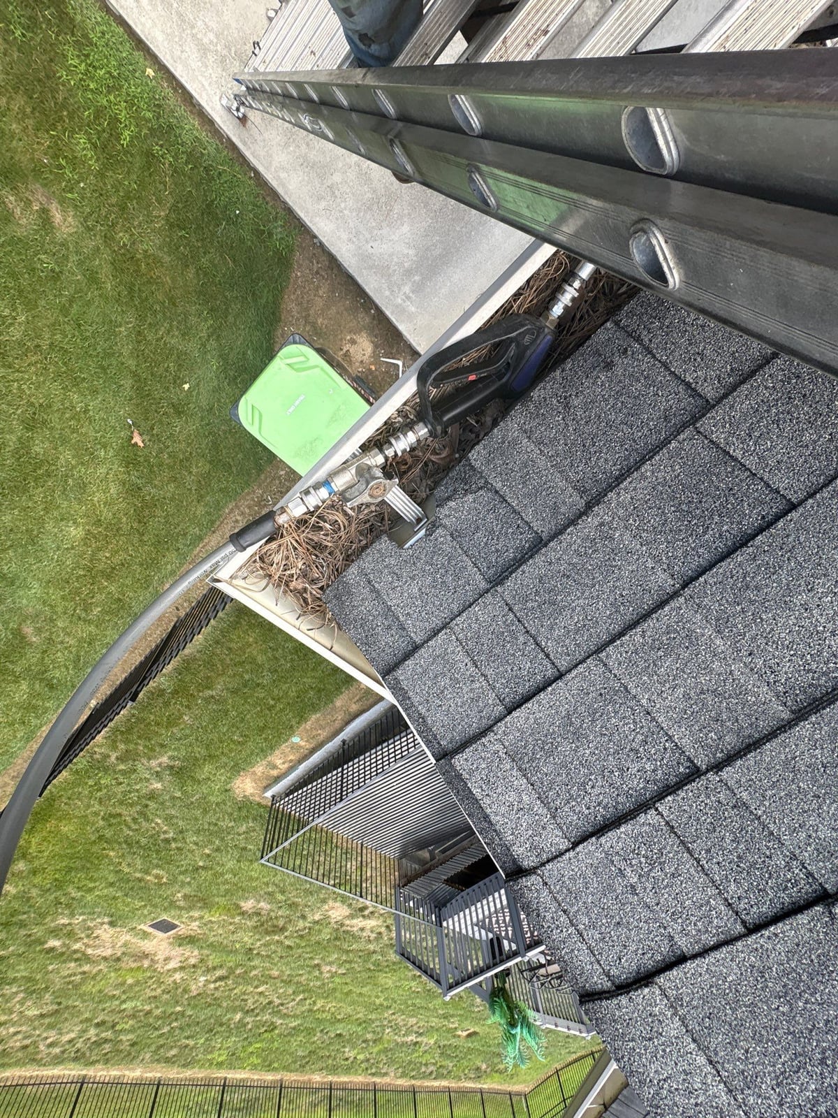 Residential roof gutter cleaning and debris removal