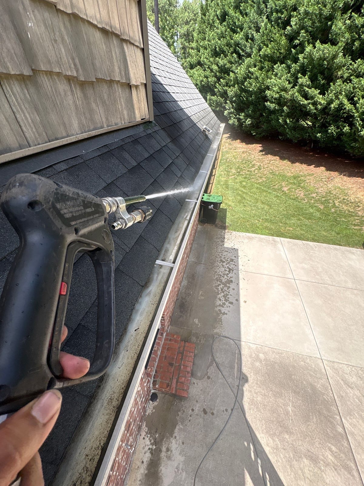 Residential roof gutter cleaning and debris removal