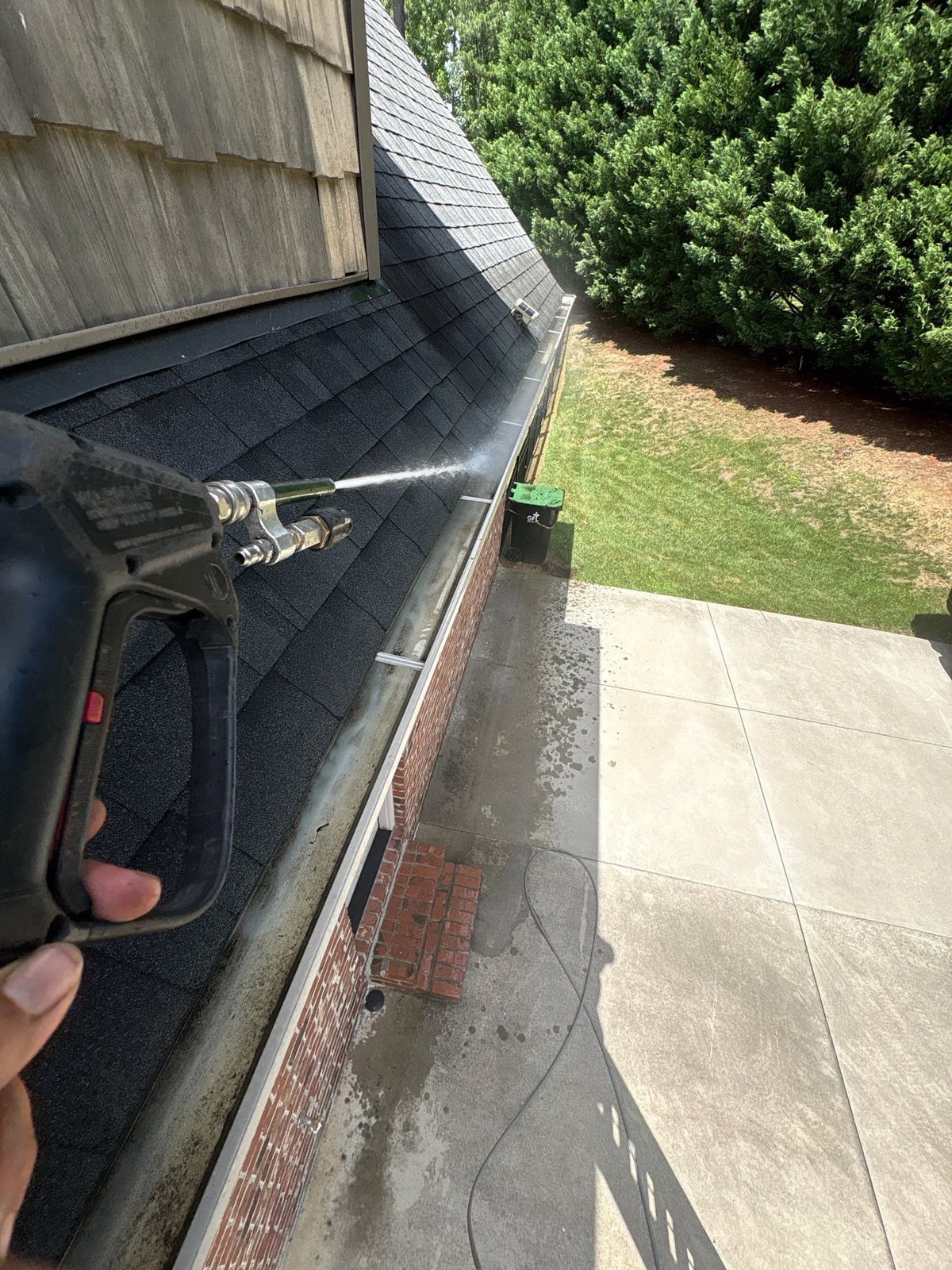 Residential roof gutter cleaning and debris removal