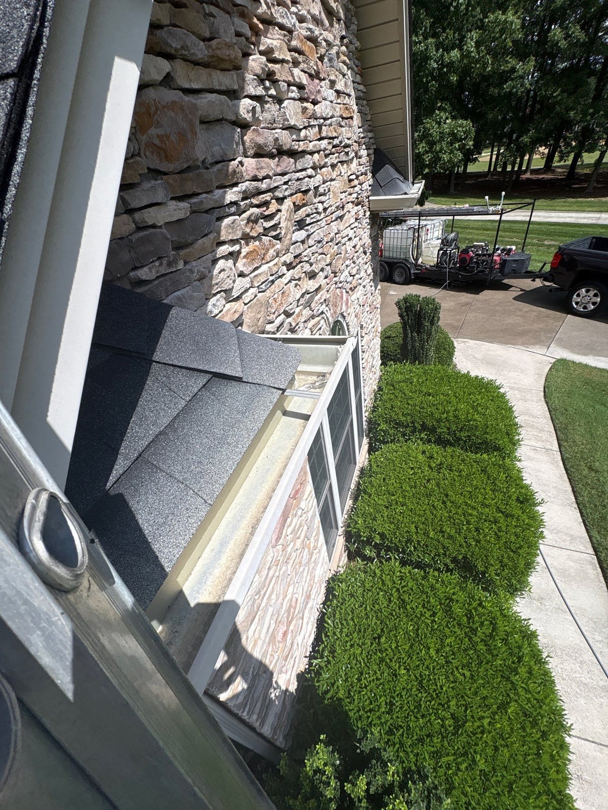 Residential roof gutter cleaning and debris removal