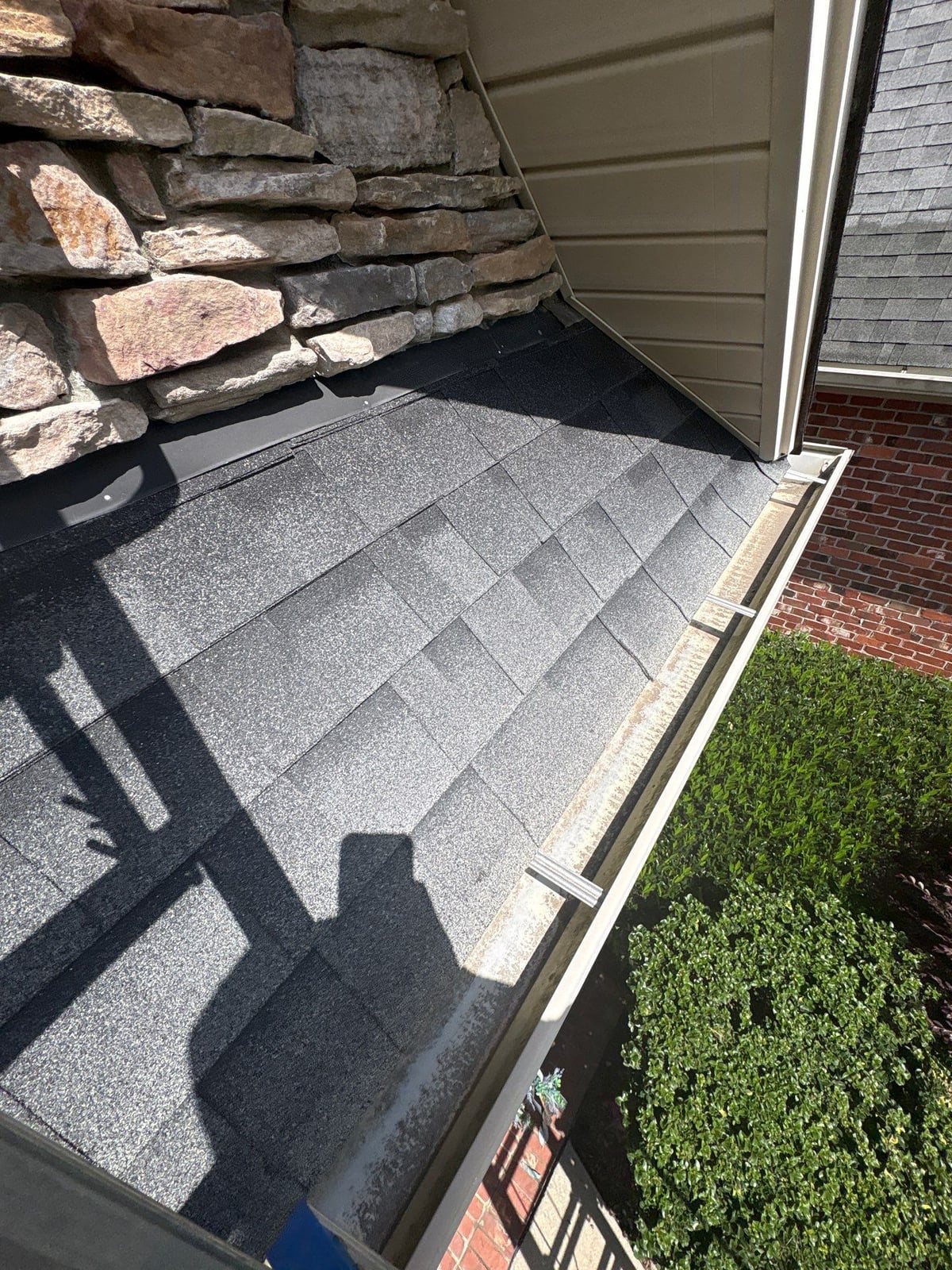 Residential roof gutter cleaning and debris removal