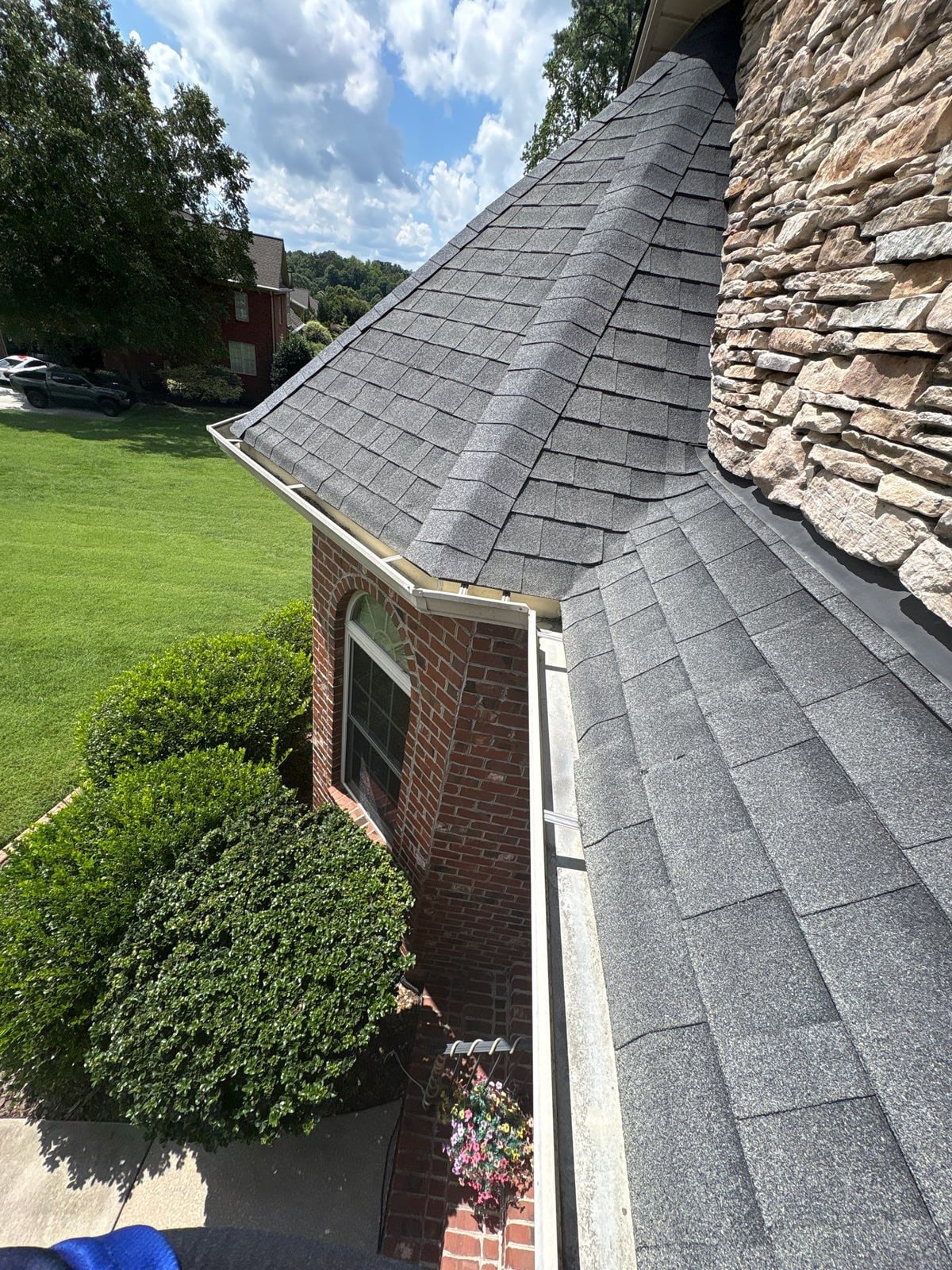Residential roof gutter cleaning and debris removal