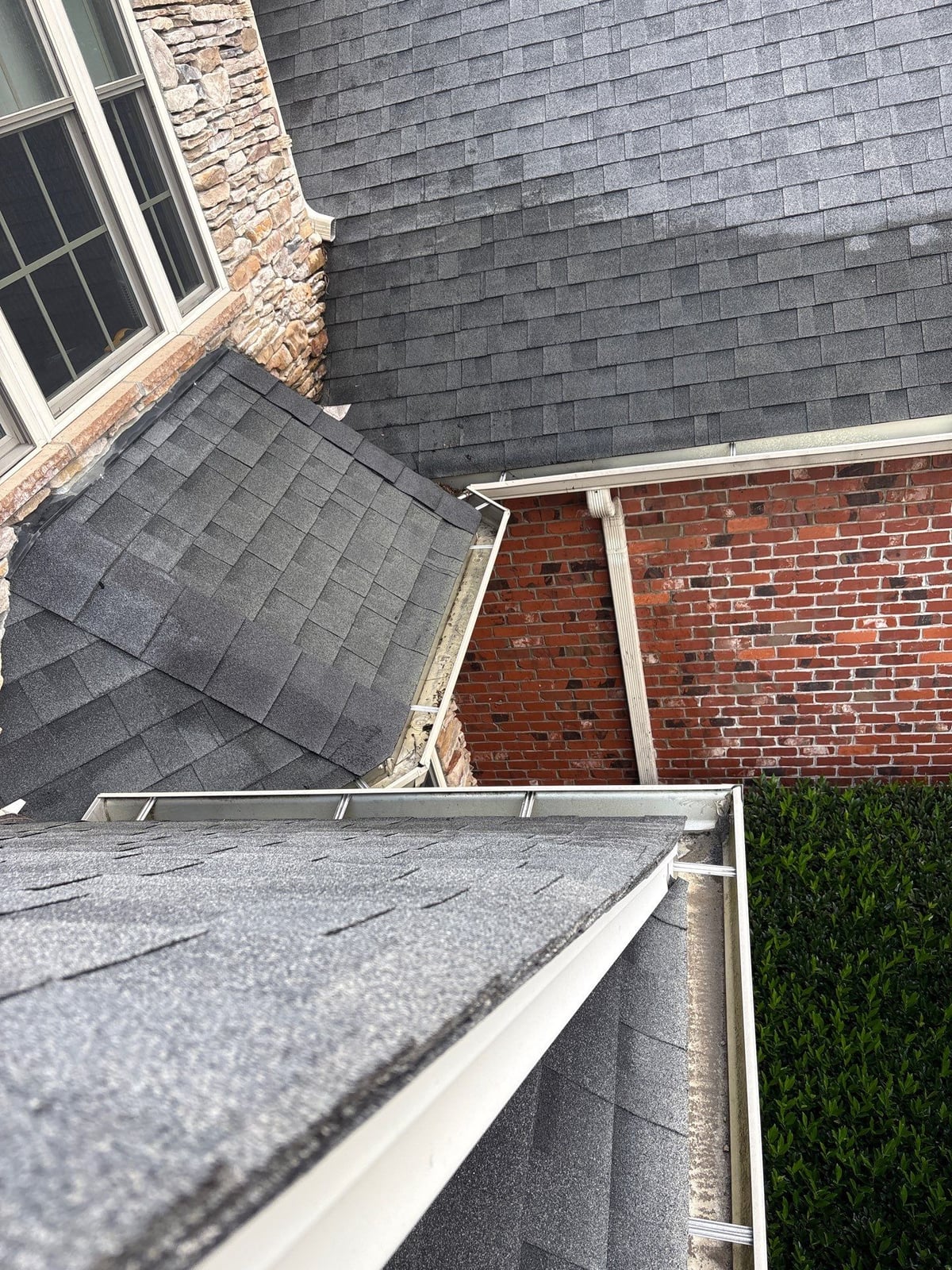 Residential roof gutter cleaning and debris removal