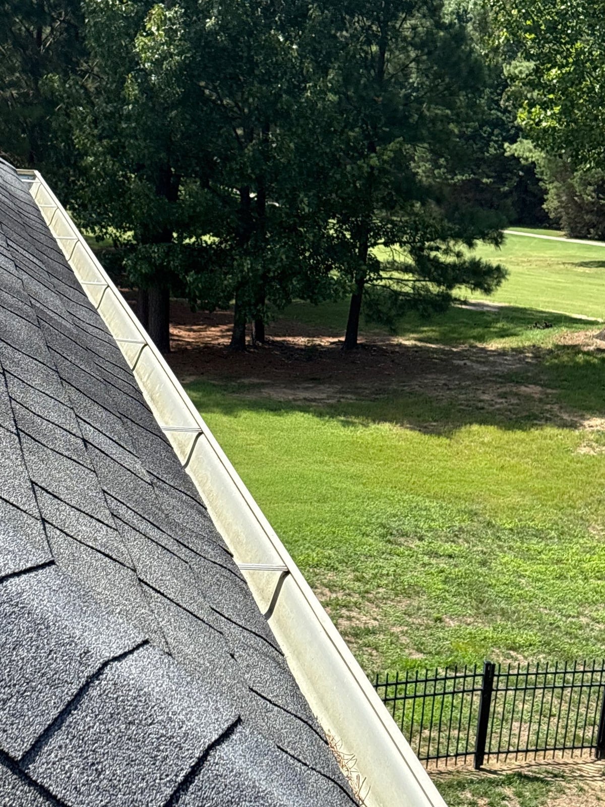 Residential roof gutter cleaning and debris removal