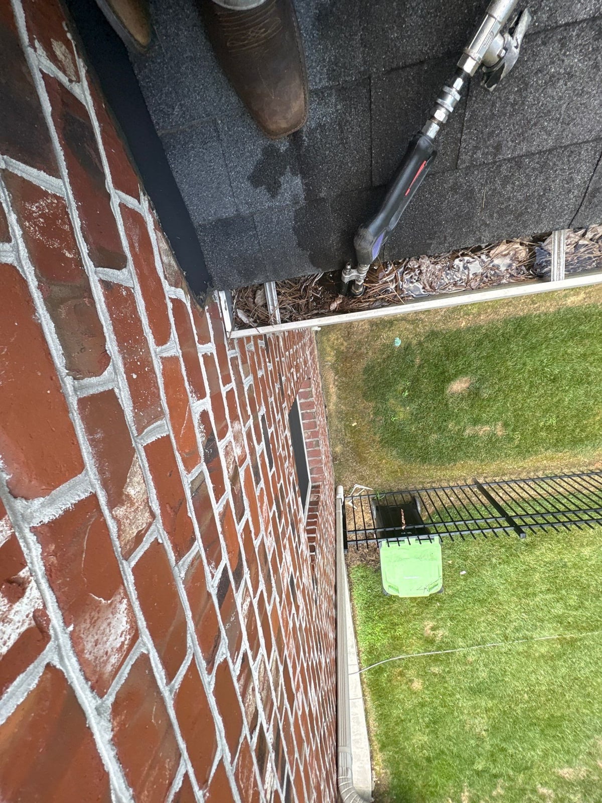 Residential roof gutter cleaning and debris removal