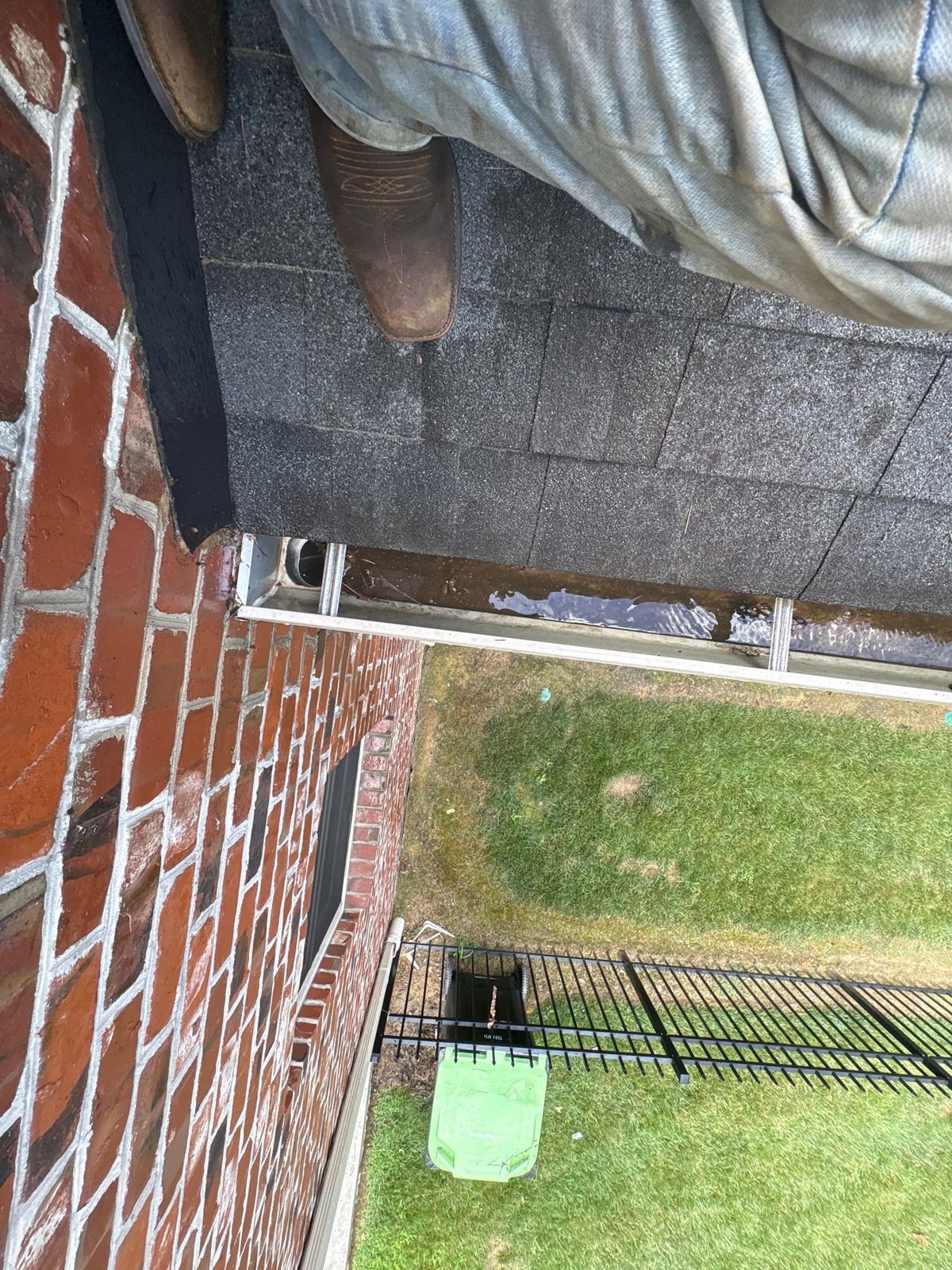 Residential roof gutter cleaning and debris removal