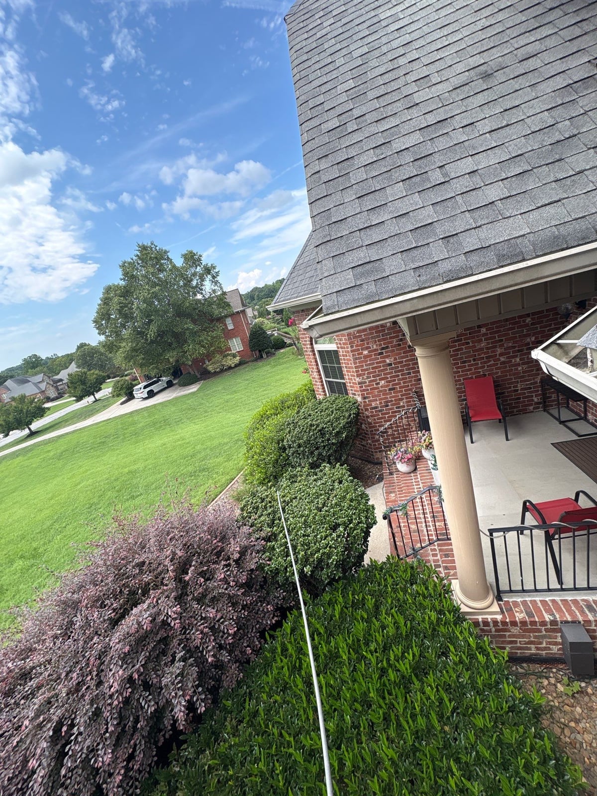 Residential roof gutter cleaning and debris removal