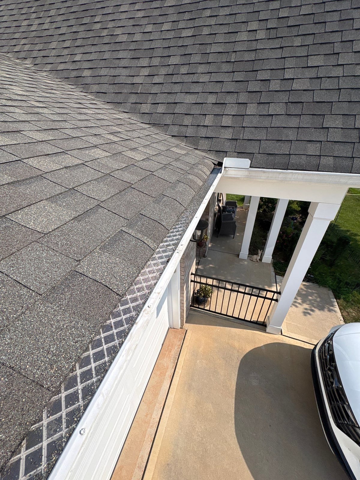 Sun porch fence and patio washing with gutter cleaning