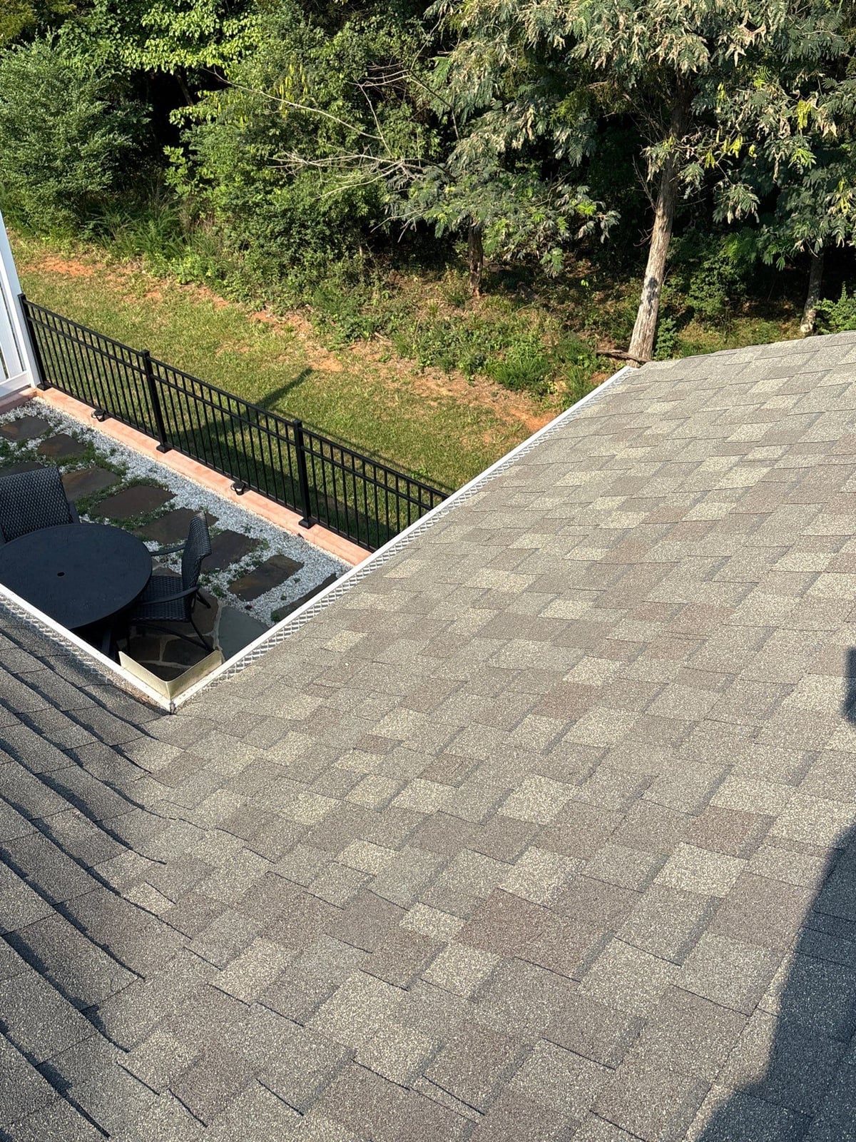 Sun porch fence and patio washing with gutter cleaning