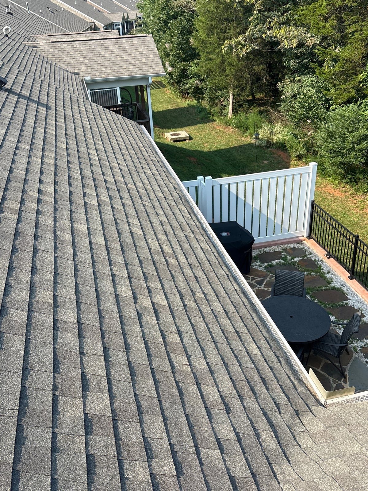 Sun porch fence and patio washing with gutter cleaning
