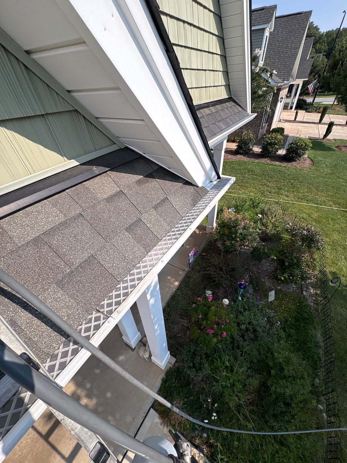 Sun porch fence and patio washing with gutter cleaning