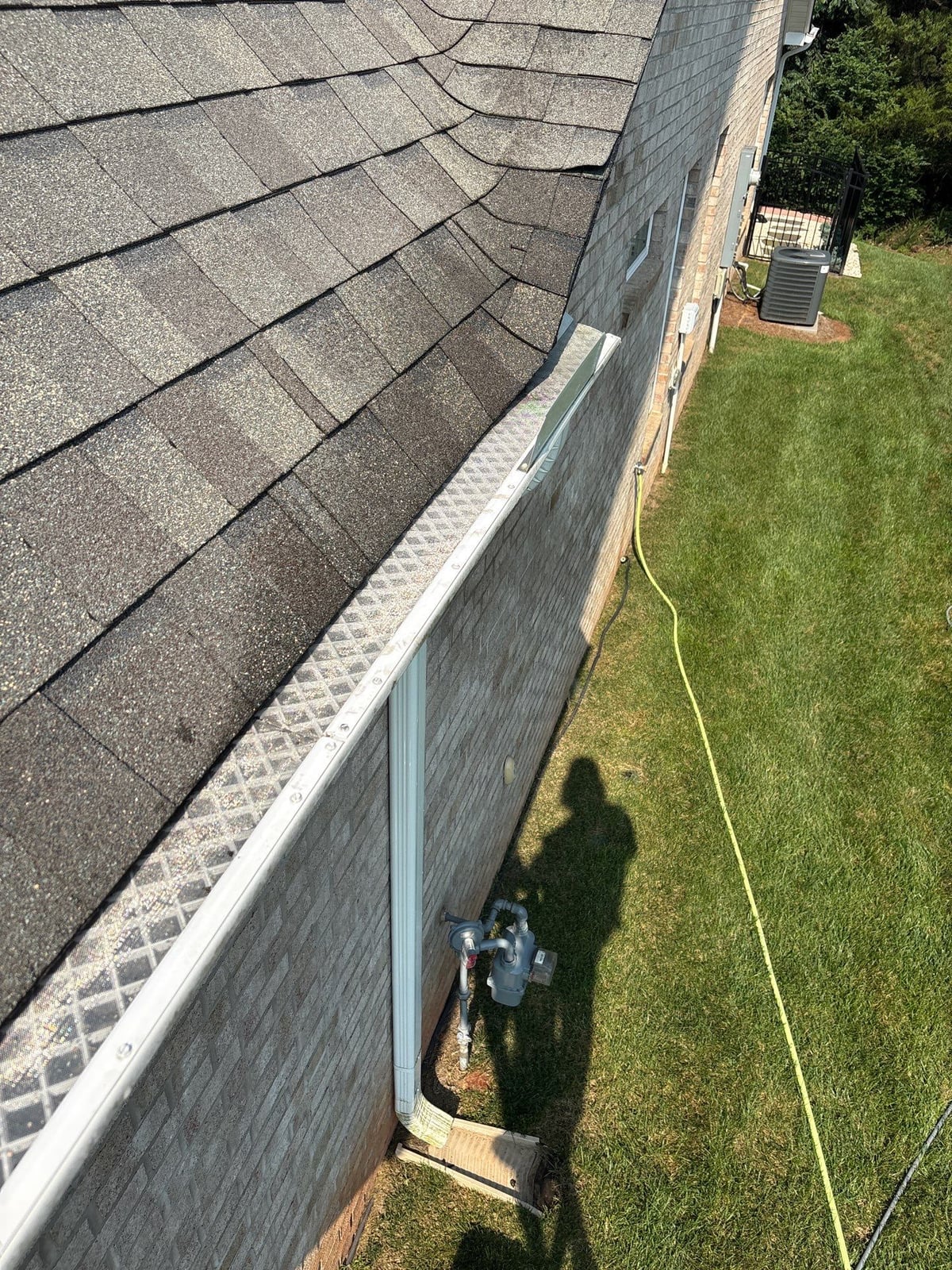 Sun porch fence and patio washing with gutter cleaning