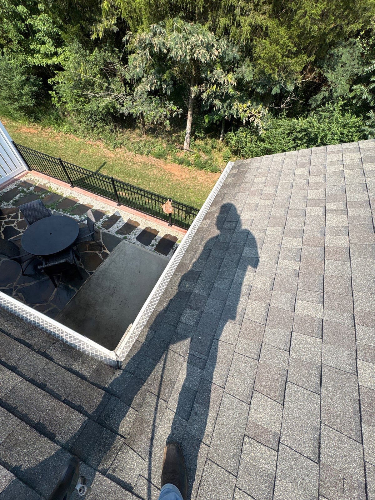 Sun porch fence and patio washing with gutter cleaning