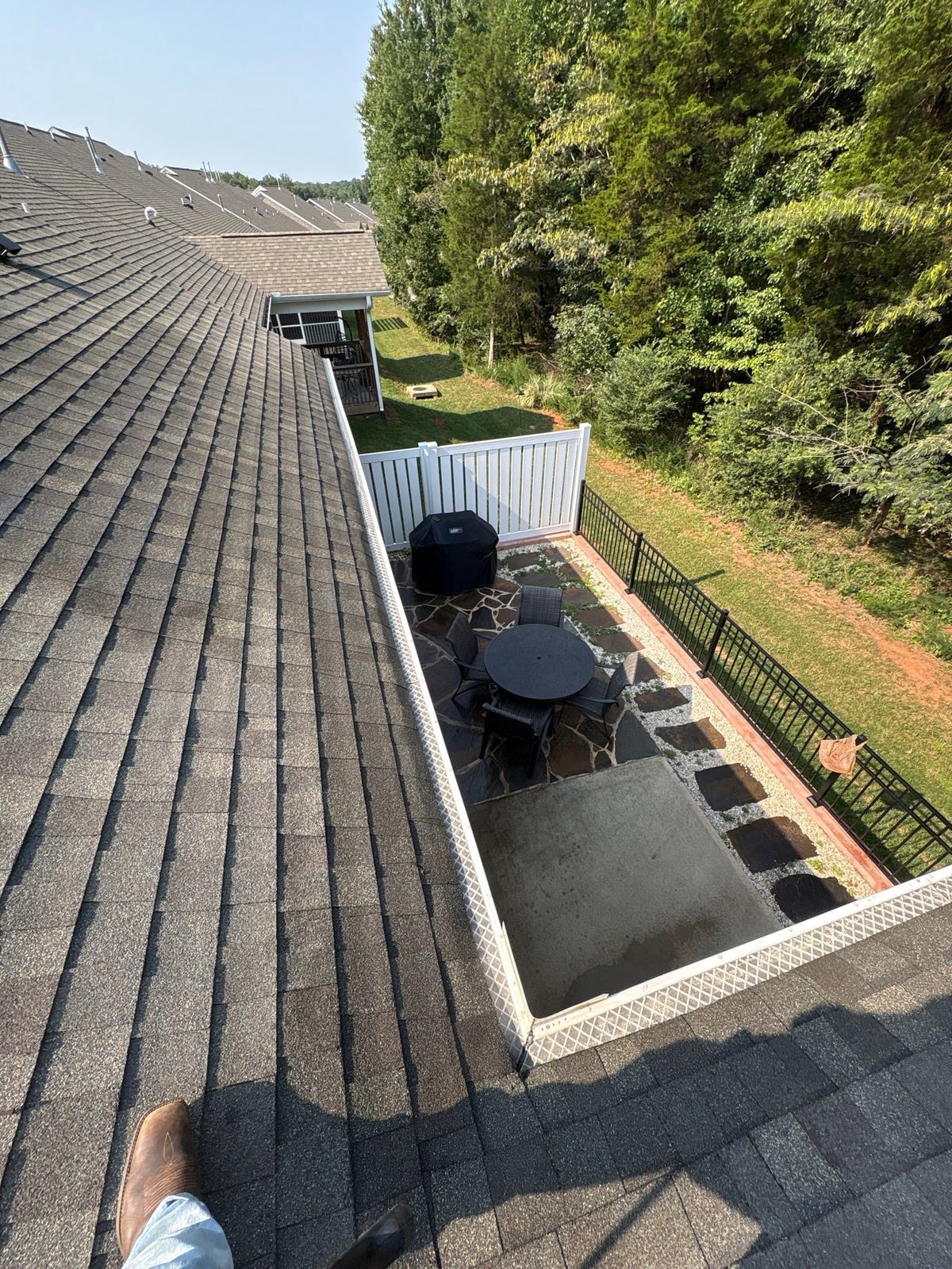 Sun porch fence and patio washing with gutter cleaning