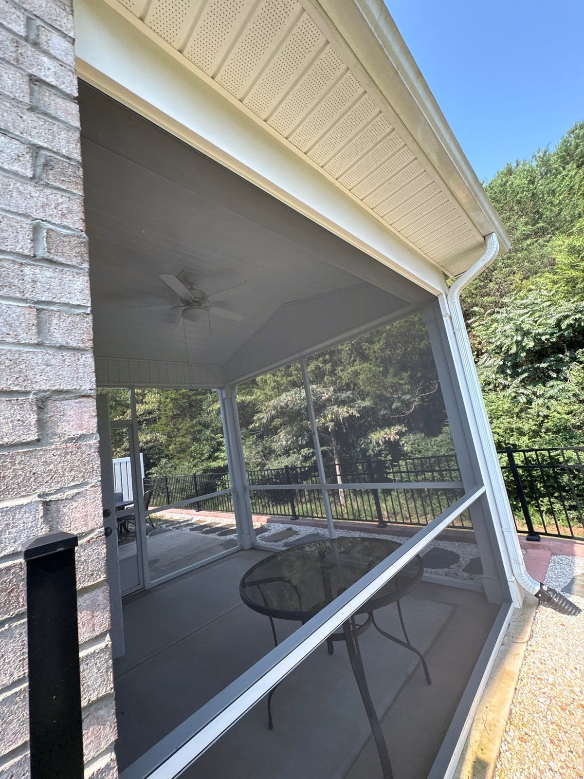 Sun porch fence and patio washing with gutter cleaning