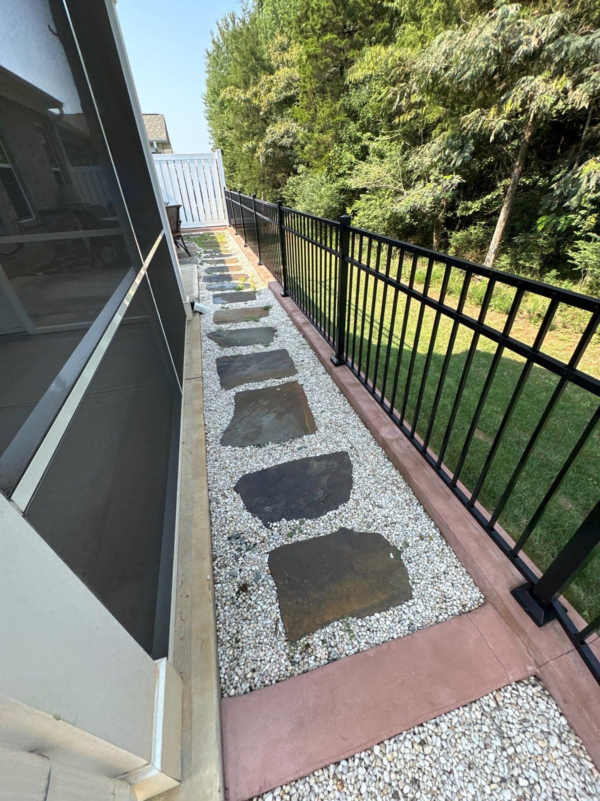 Sun porch fence and patio washing with gutter cleaning
