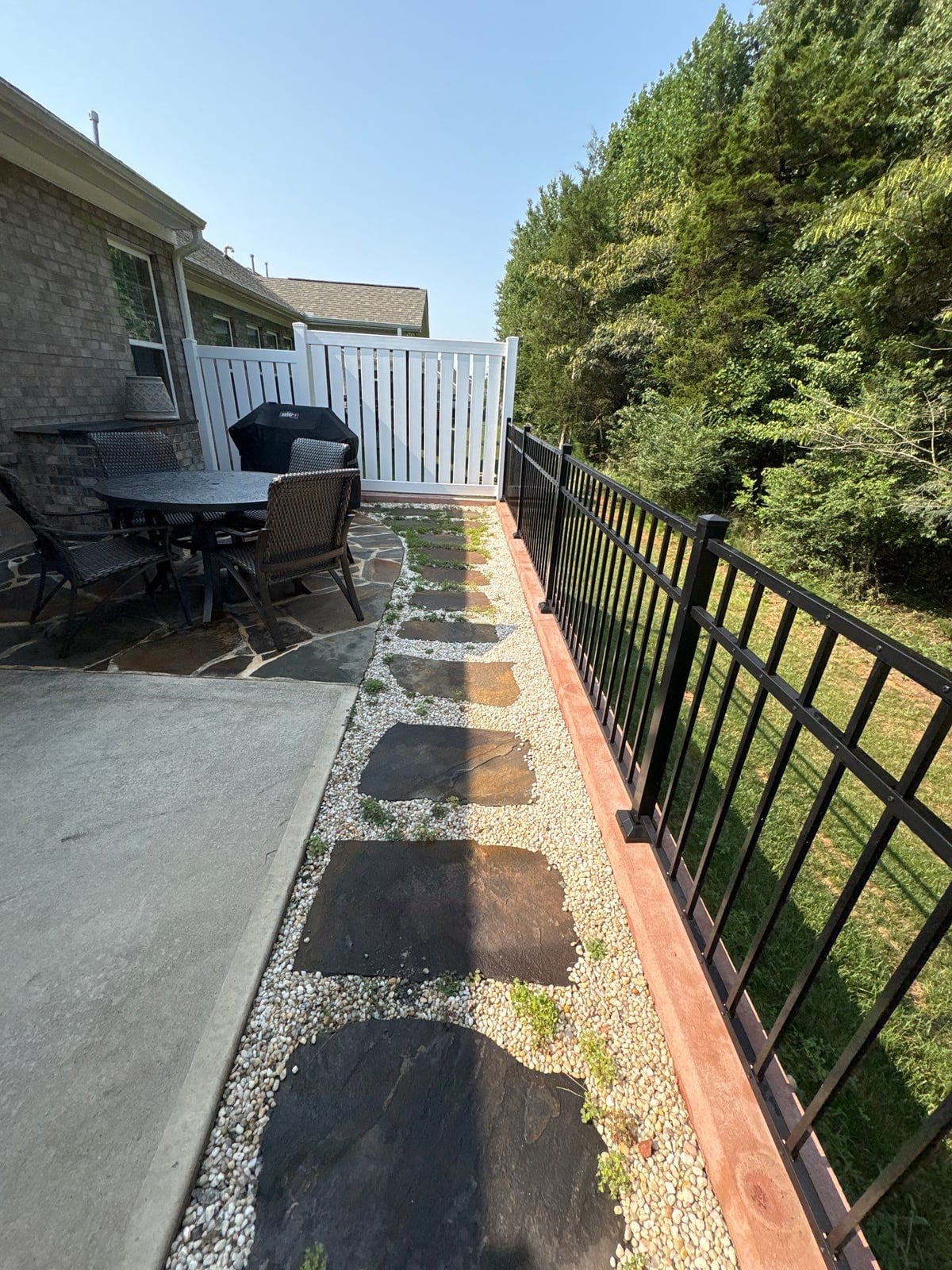 Sun porch fence and patio washing with gutter cleaning