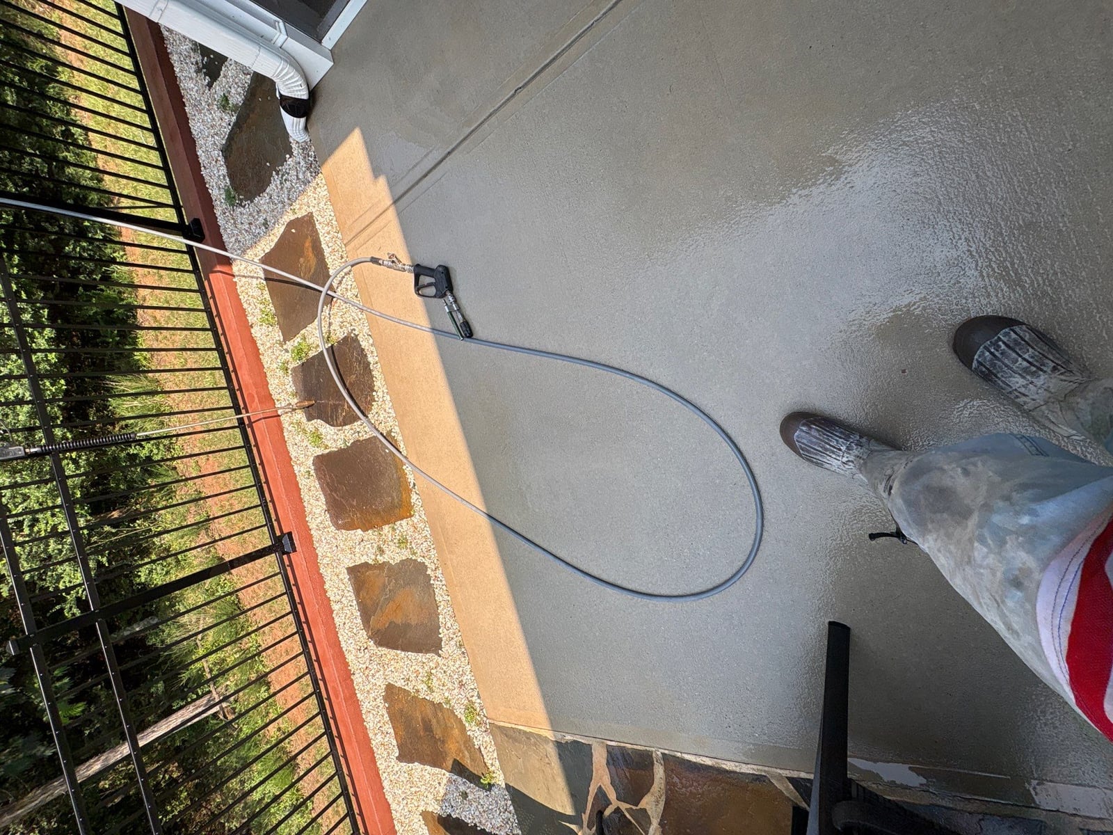 Sun porch fence and patio washing with gutter cleaning