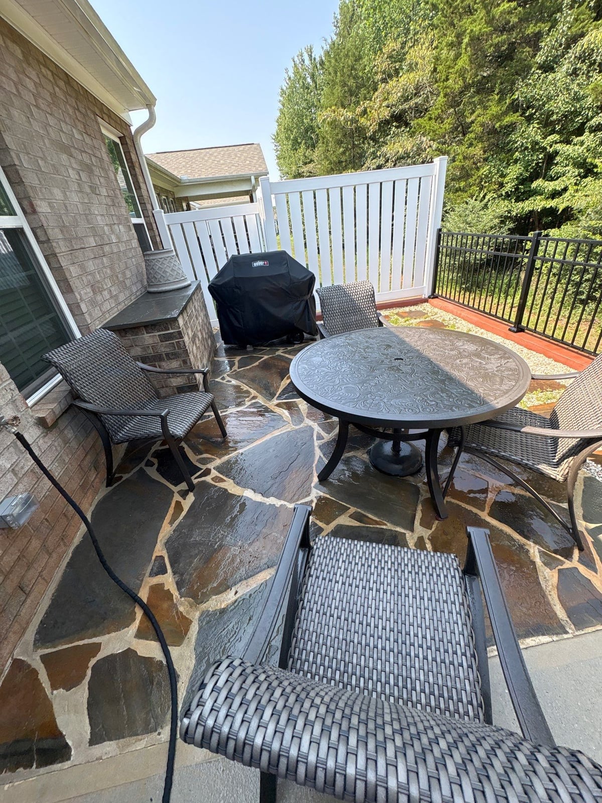 Sun porch fence and patio washing with gutter cleaning