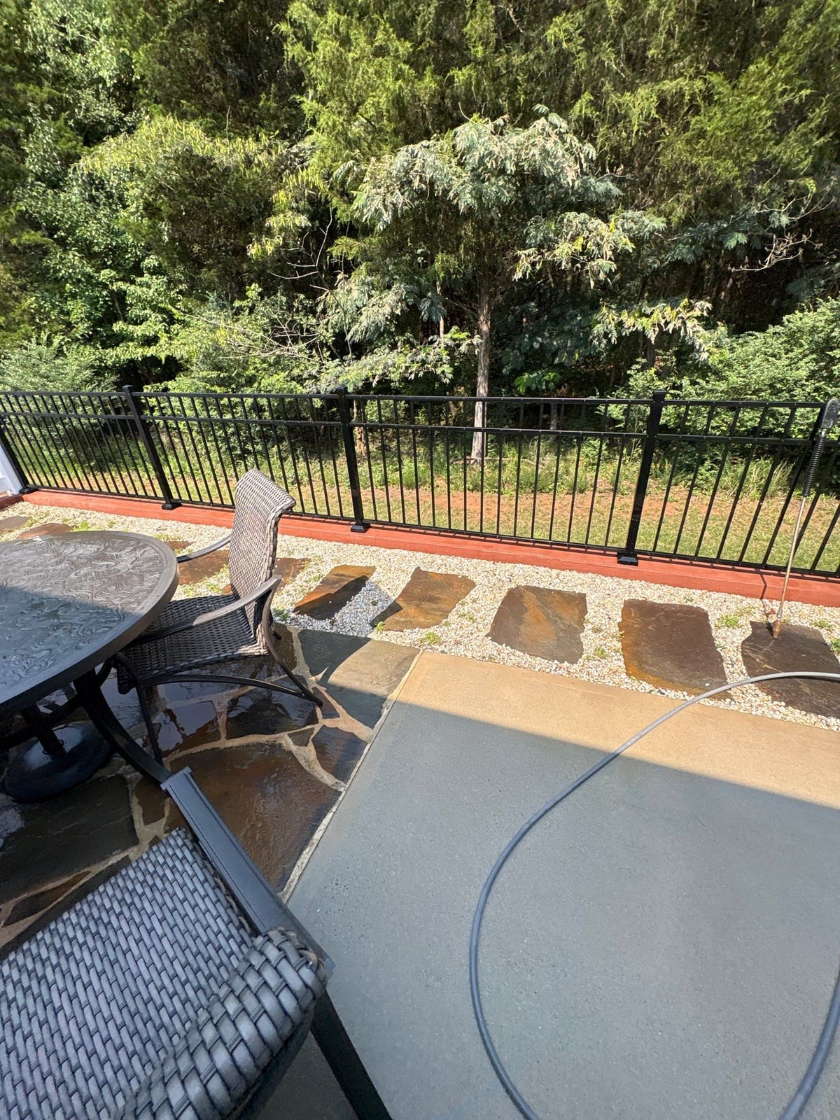 Sun porch fence and patio washing with gutter cleaning