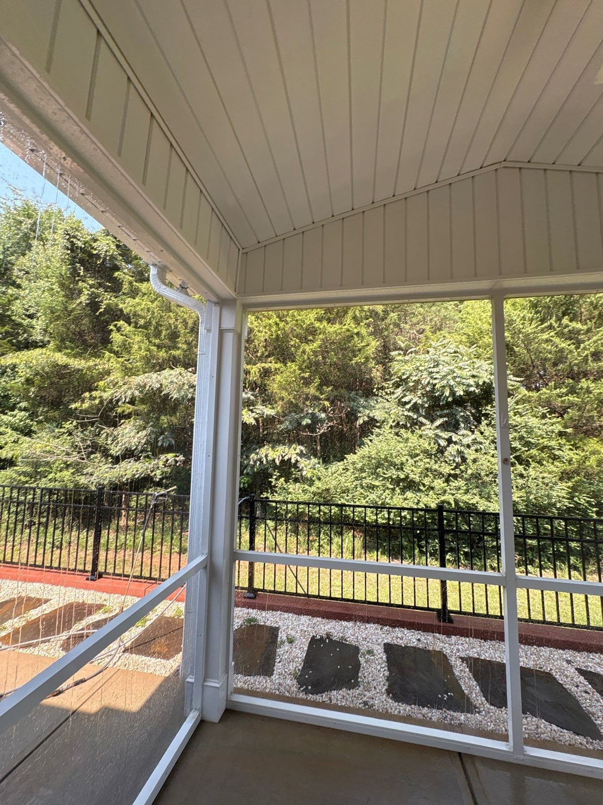 Sun porch fence and patio washing with gutter cleaning