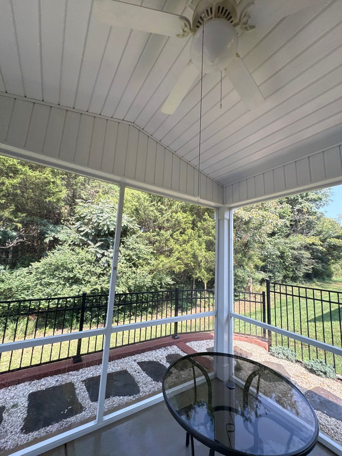 Sun porch fence and patio washing with gutter cleaning