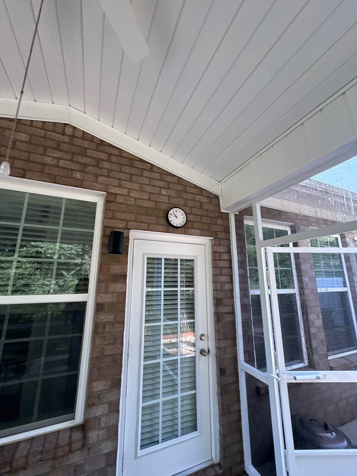 Sun porch fence and patio washing with gutter cleaning