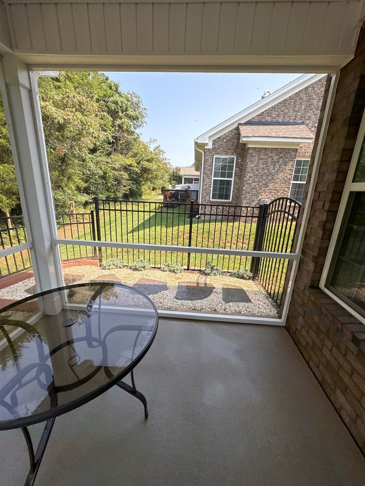 Sun porch fence and patio washing with gutter cleaning