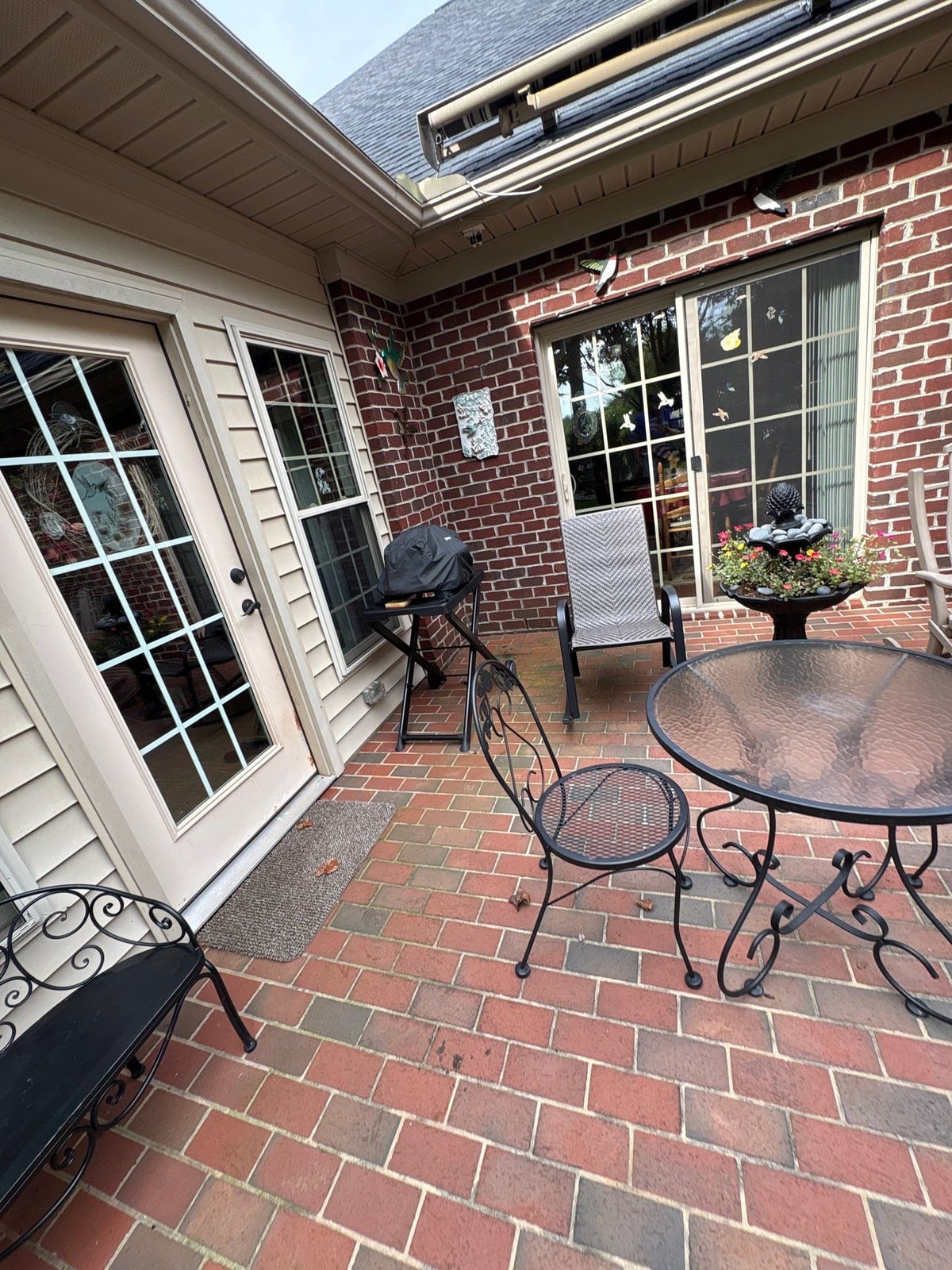 Brick patio pavers installation with front walkway and washing