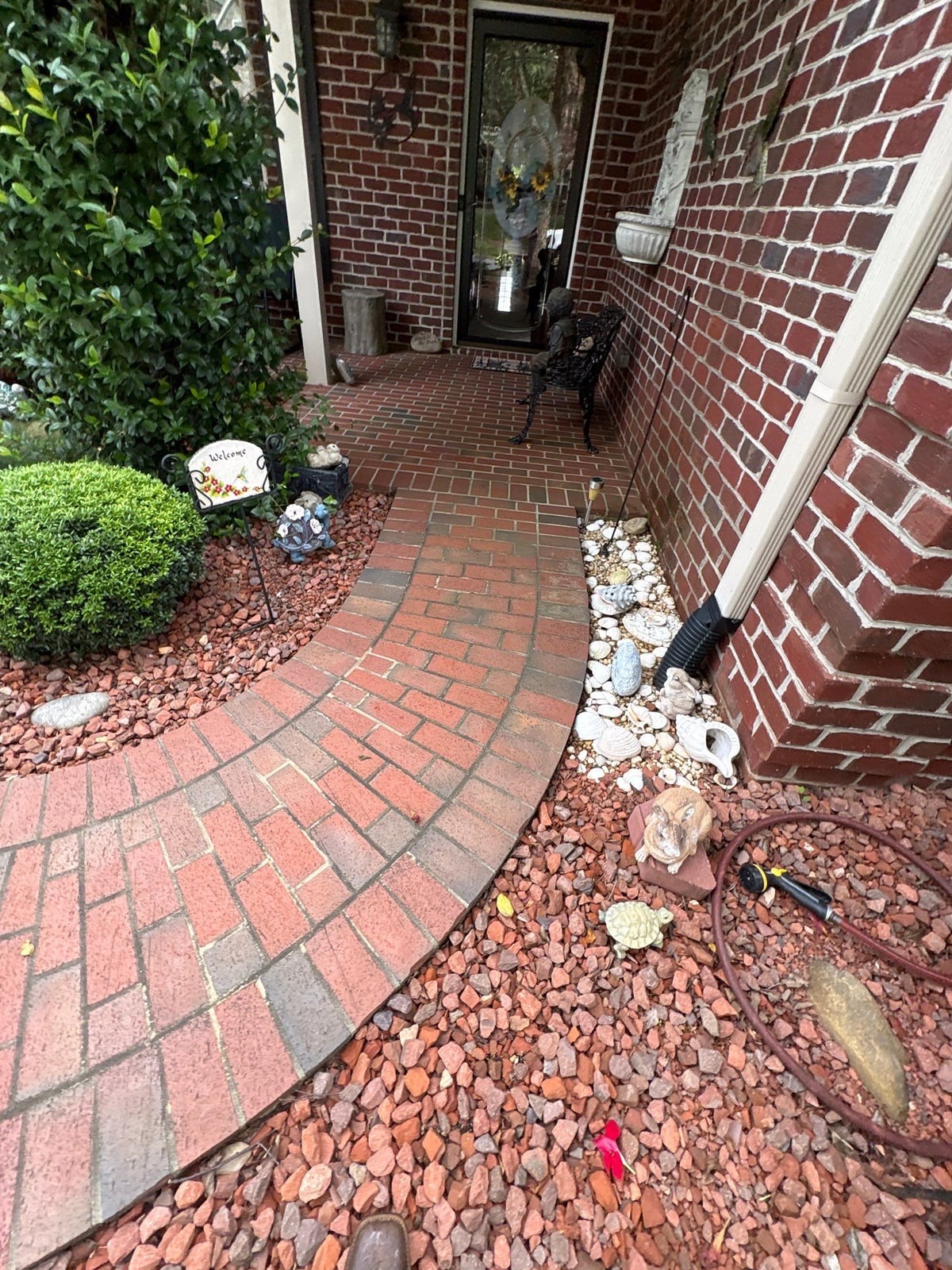 Brick patio pavers installation with front walkway and washing