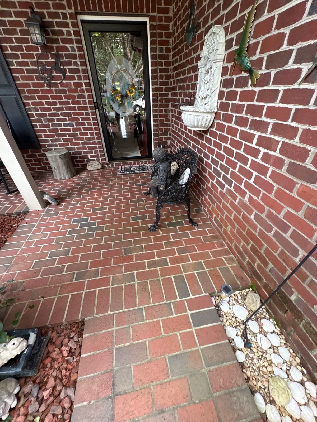 Brick patio pavers installation with front walkway and washing
