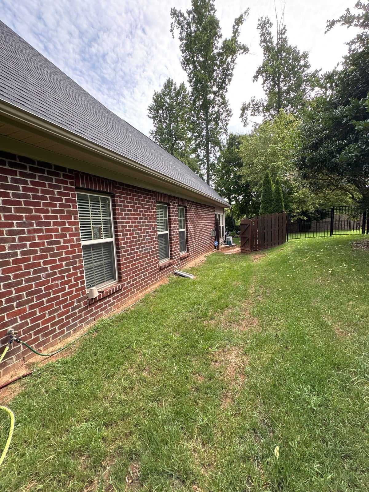 Brick patio pavers installation with front walkway and washing
