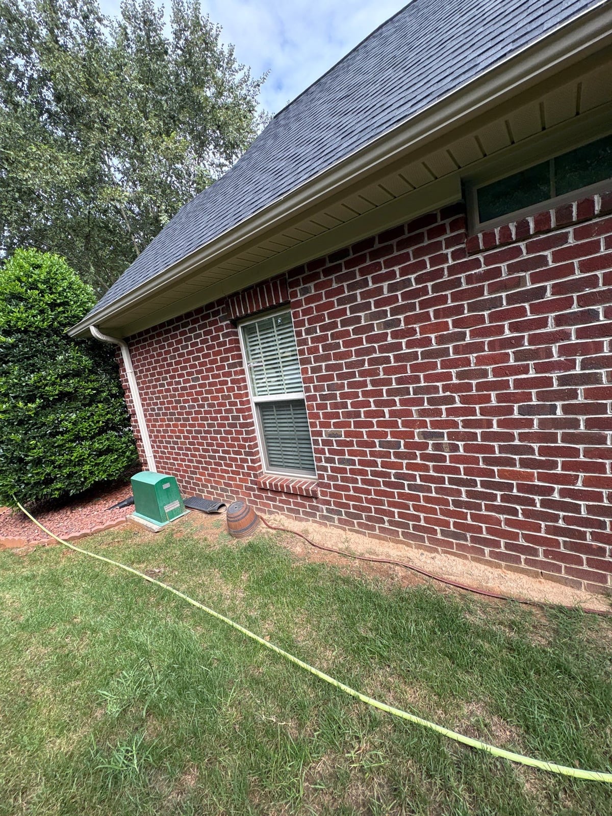 Brick patio pavers installation with front walkway and washing