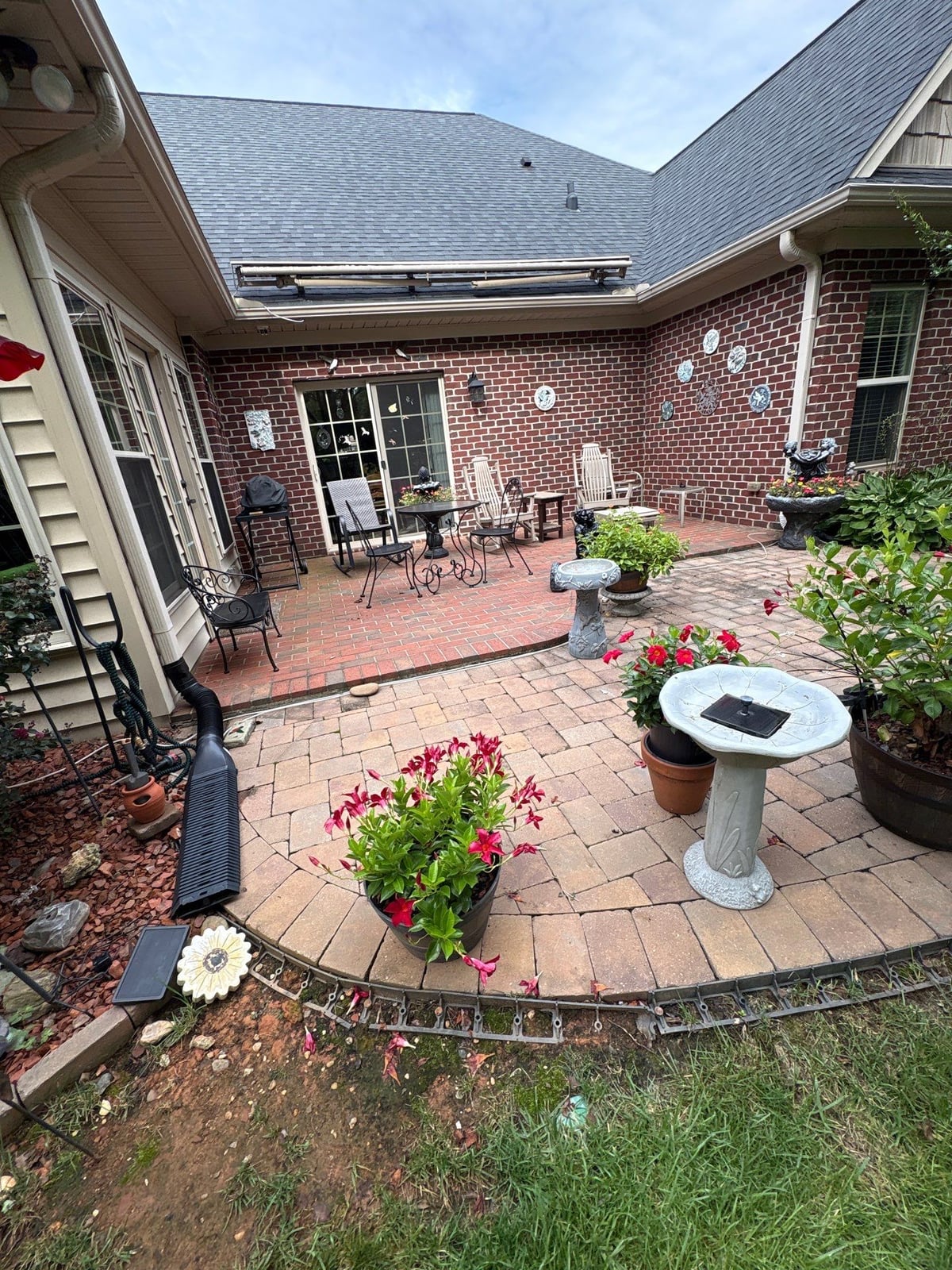 Brick patio pavers installation with front walkway and washing