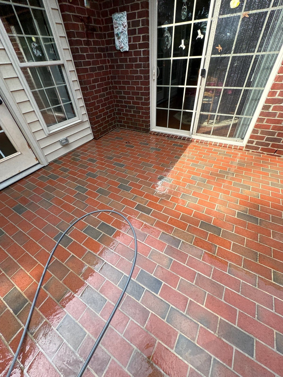 Brick patio pavers installation with front walkway and washing