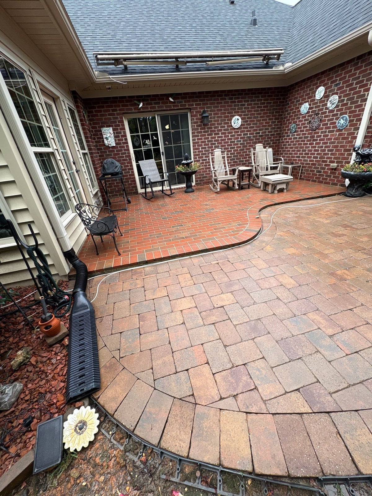 Brick patio pavers installation with front walkway and washing