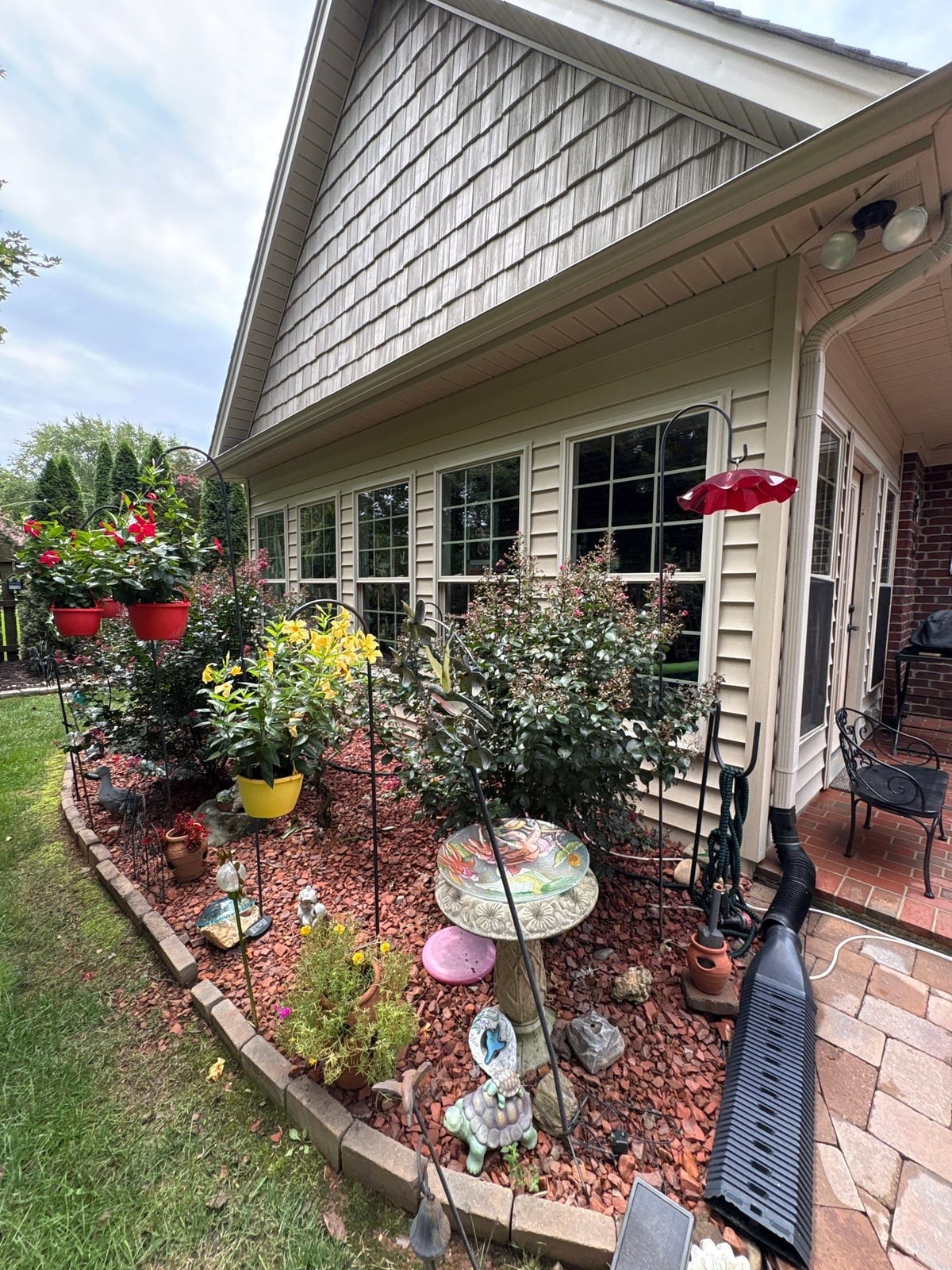 Brick patio pavers installation with front walkway and washing