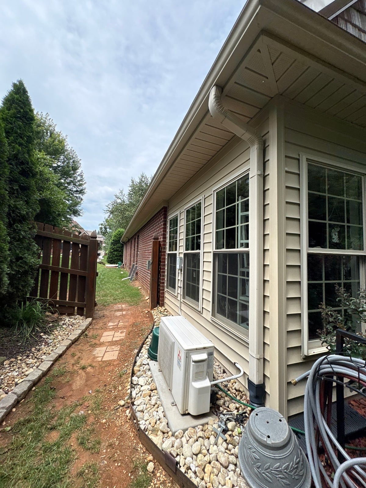 Brick patio pavers installation with front walkway and washing