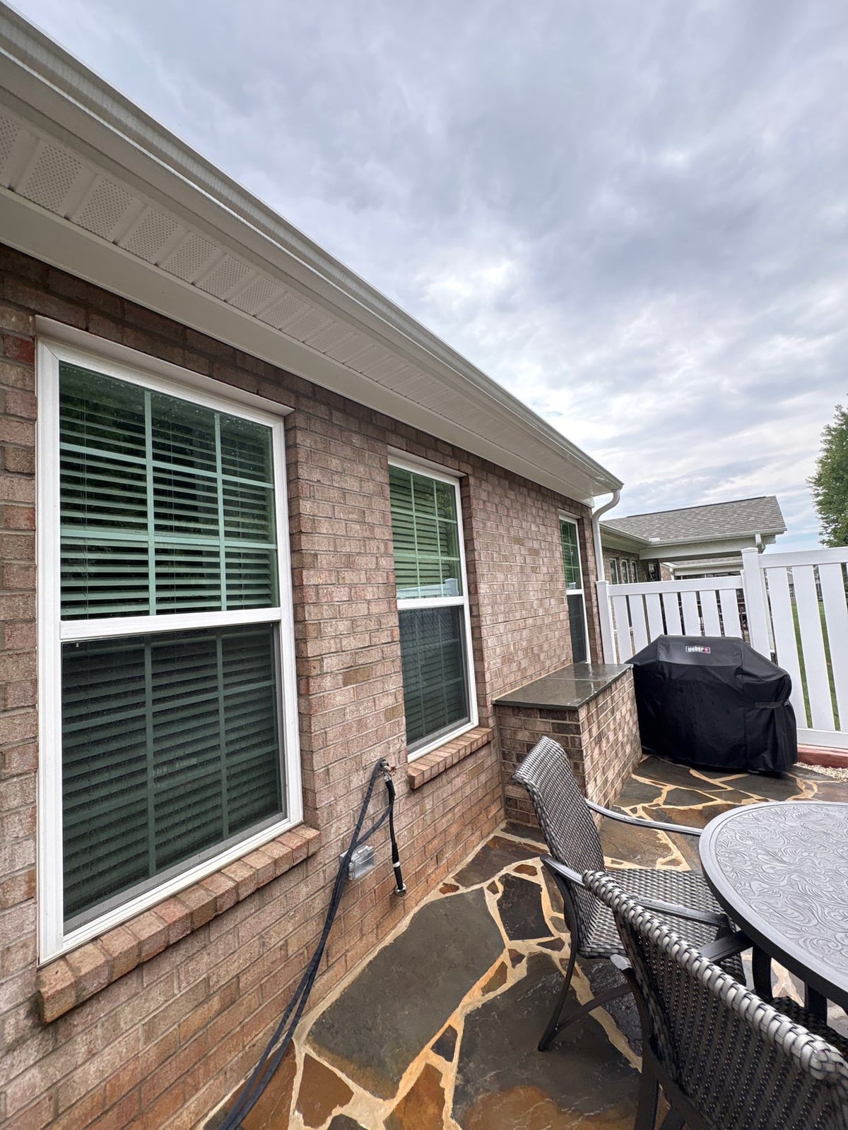 Brick patio pavers installation with front walkway and washing