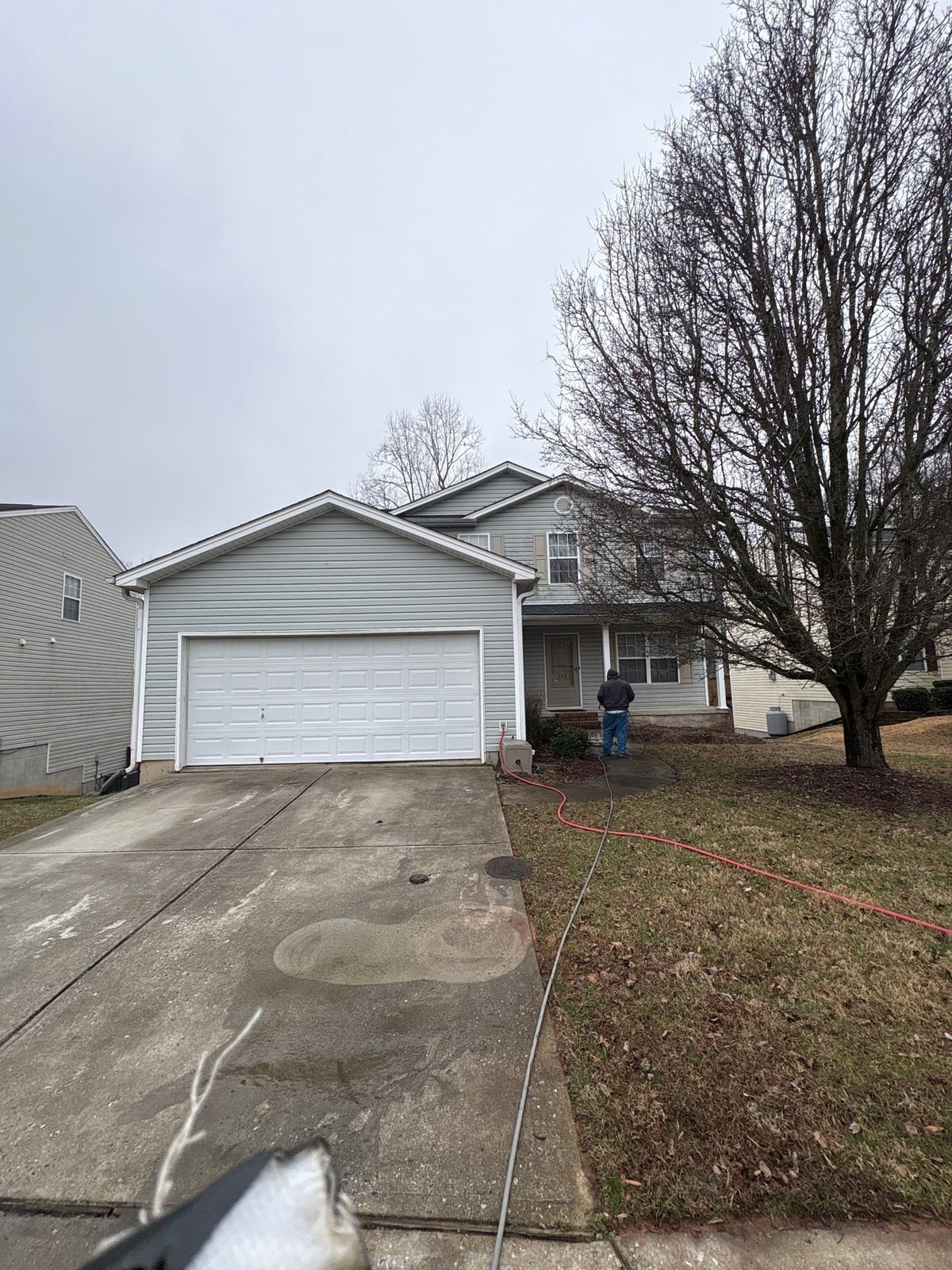 Exterior house washing and concrete driveway pressure cleaning