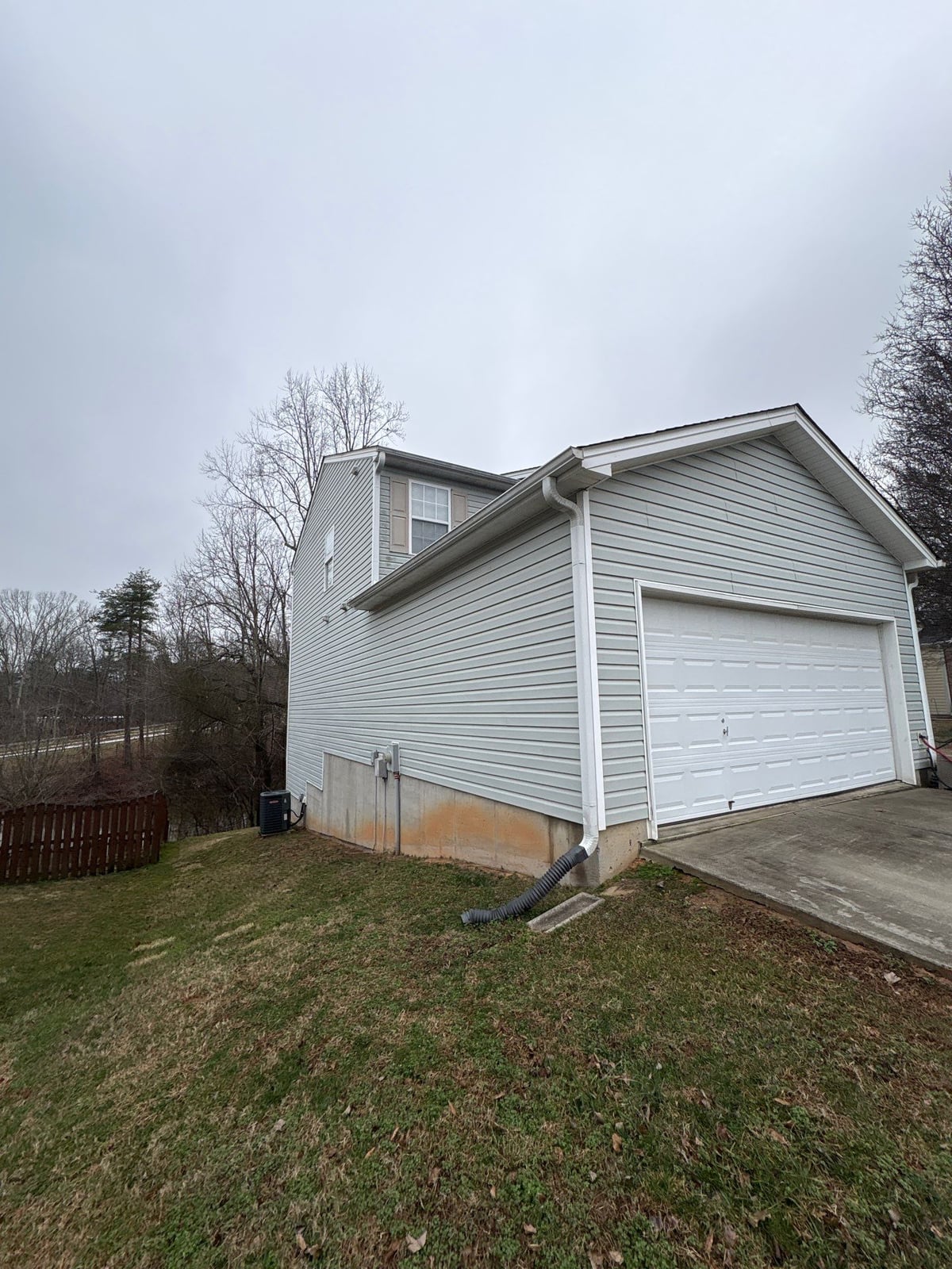 Exterior house washing and concrete driveway pressure cleaning