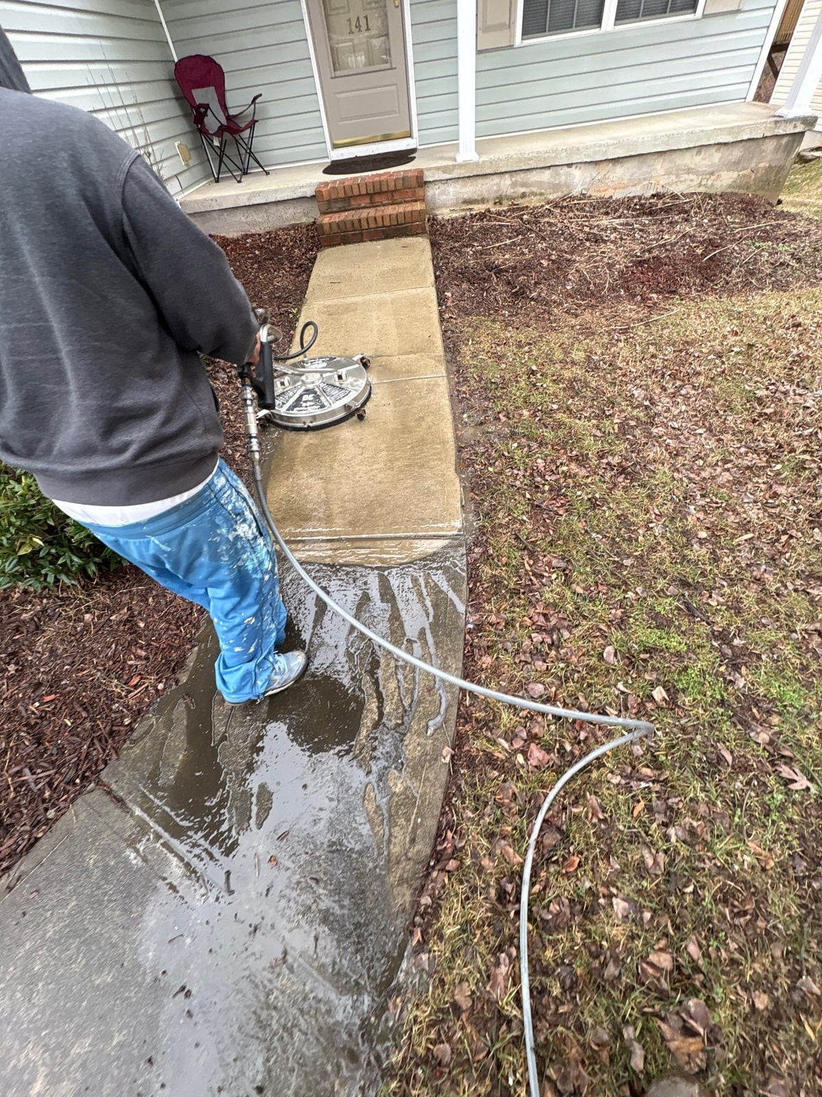 Exterior house washing and concrete driveway pressure cleaning
