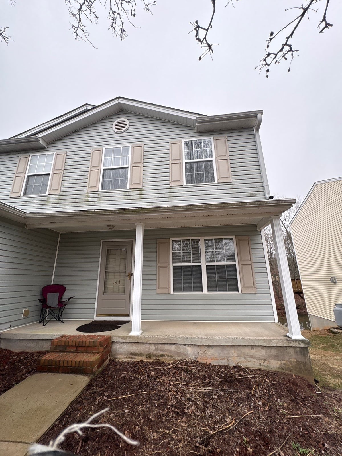 Exterior house washing and concrete driveway pressure cleaning