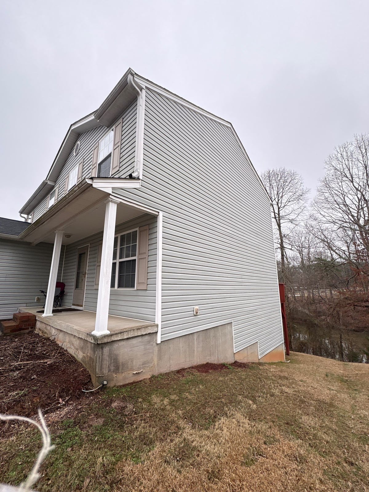 Exterior house washing and concrete driveway pressure cleaning