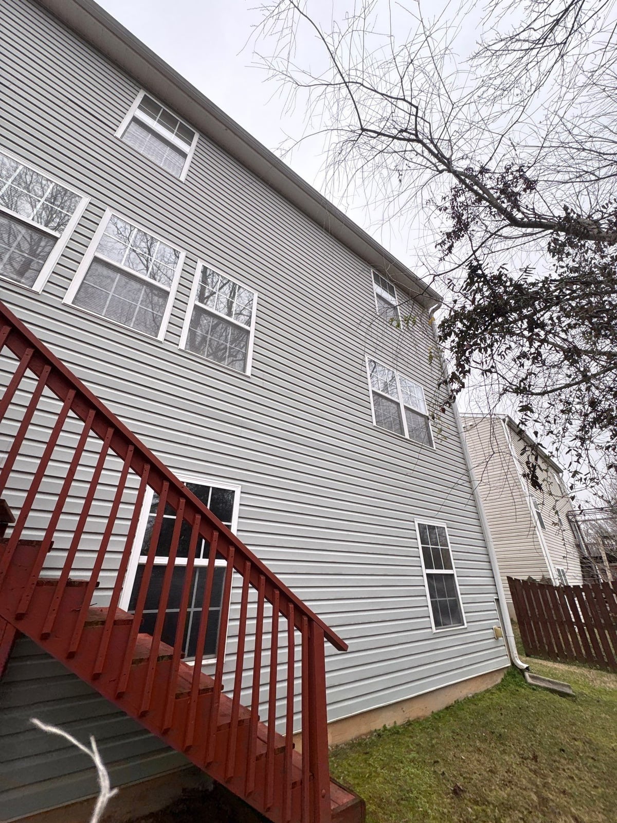 Exterior house washing and concrete driveway pressure cleaning