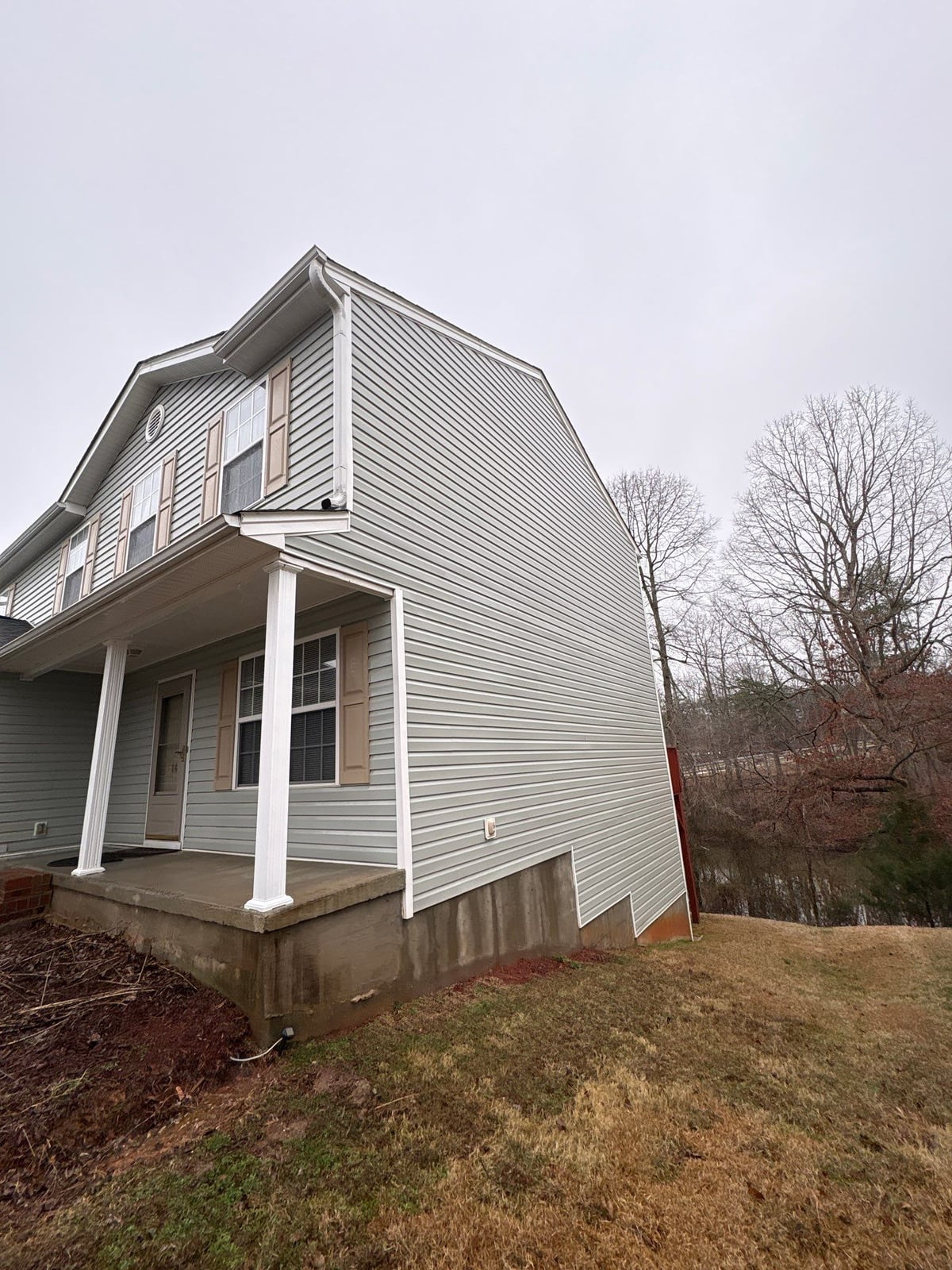 Exterior house washing and concrete driveway pressure cleaning