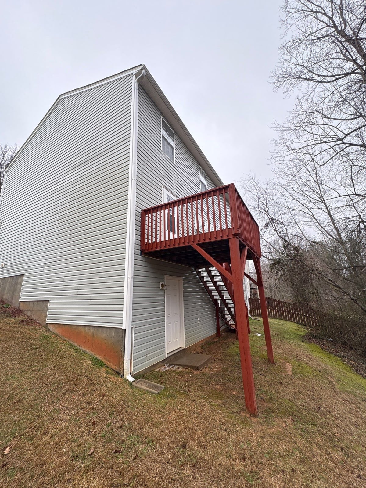 Exterior house washing and concrete driveway pressure cleaning