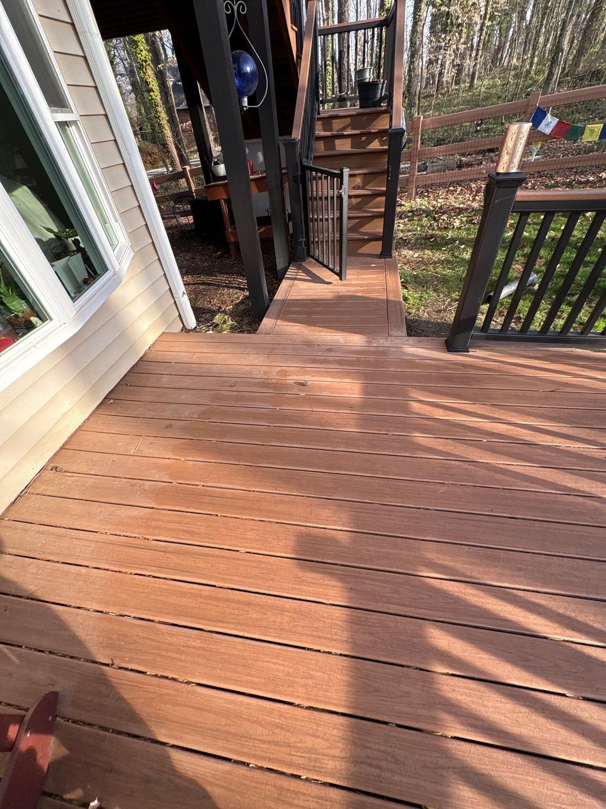 Gutter cleaning and exterior deck power washing services