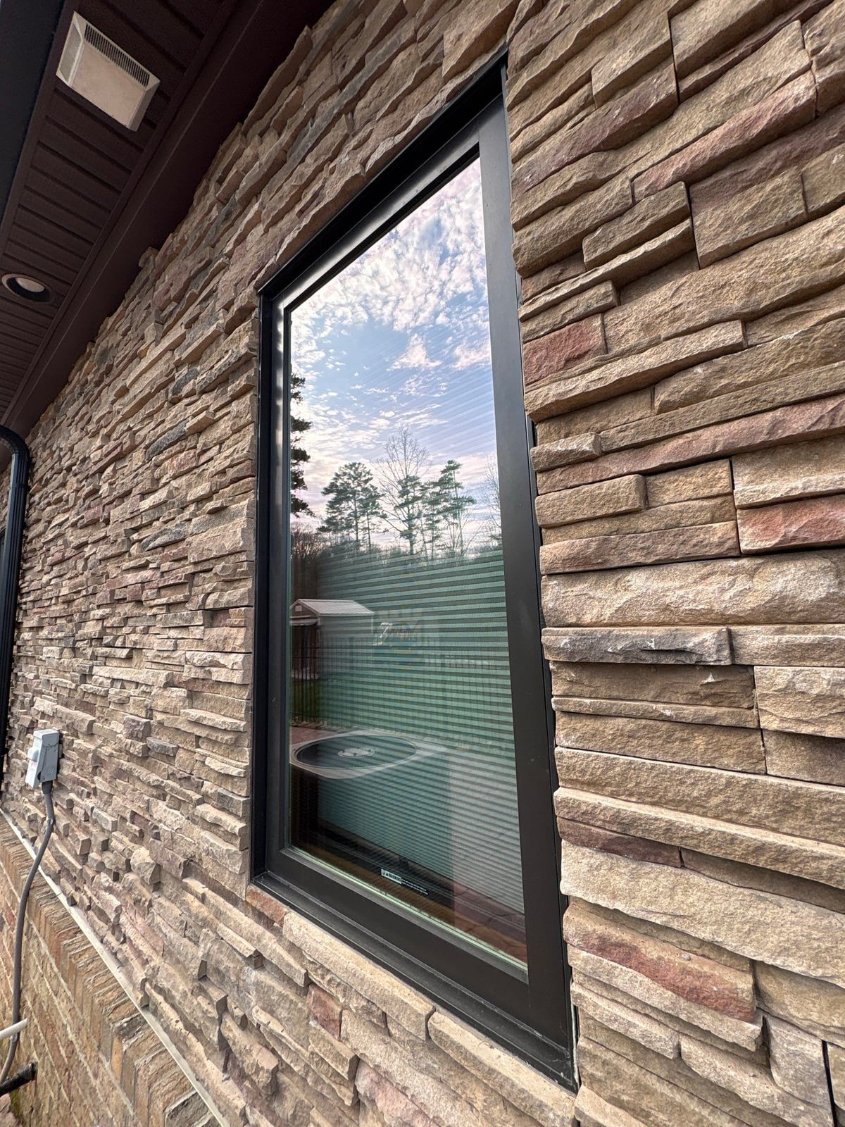 Exterior gutter cleaning and residential window washing services